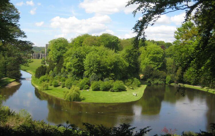 Fountains Abbey - View of Fountains Abbey over the Water Garden View of Fountains Abbey over the Water Garden