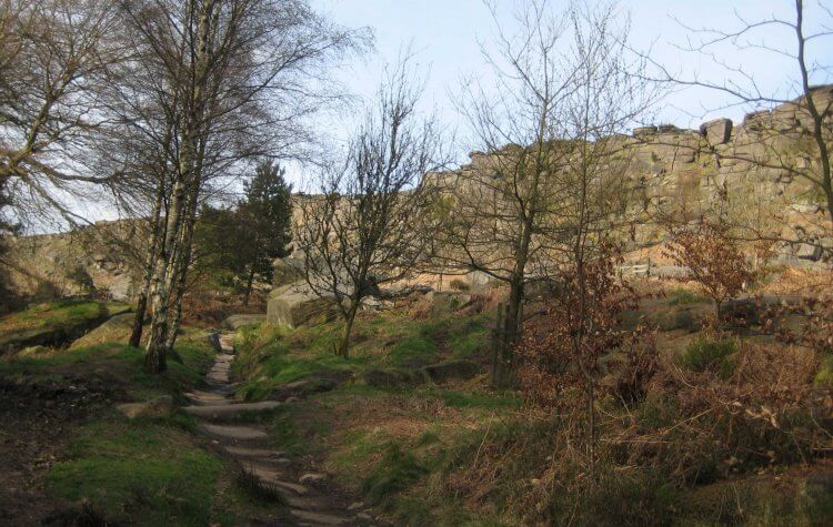 View of Stanage Edge cliffs from the path