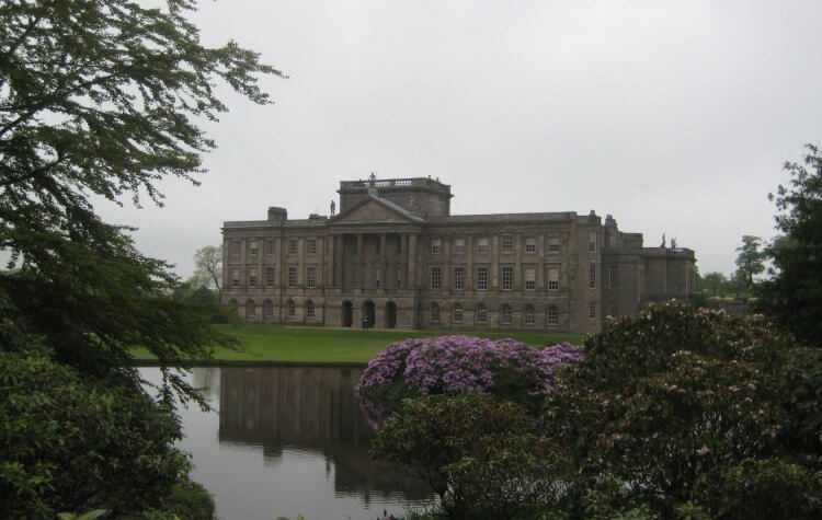 Lyme Park - View of Lyme Park Mansion House across the lake View of Lyme Park Mansion House across the lake