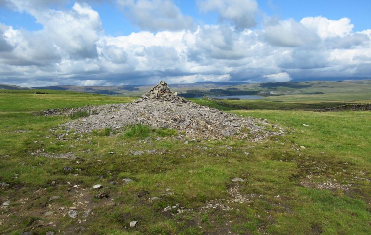 Settle - View of Malham Tarn from a stone cairn on Ewe Moor View of Malham Tarn from a stone cairn on Ewe Moor