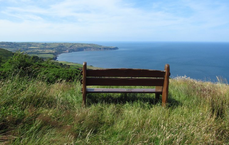 Bench with distant view of Robin Hood's Bay